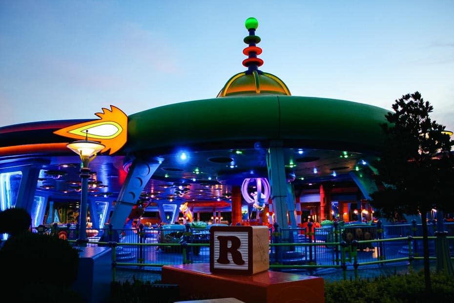 Alien Swirling Saucers in Toy Story Land at night 