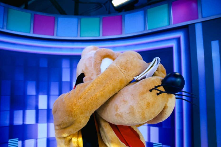 Pluto signs his autograph at Hollywood Studios 