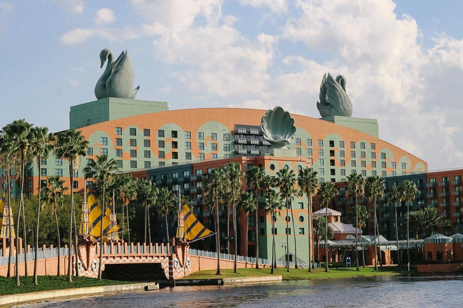 a view of the Walt Disney World Swan Hotel with the sunlight reflecting on it 