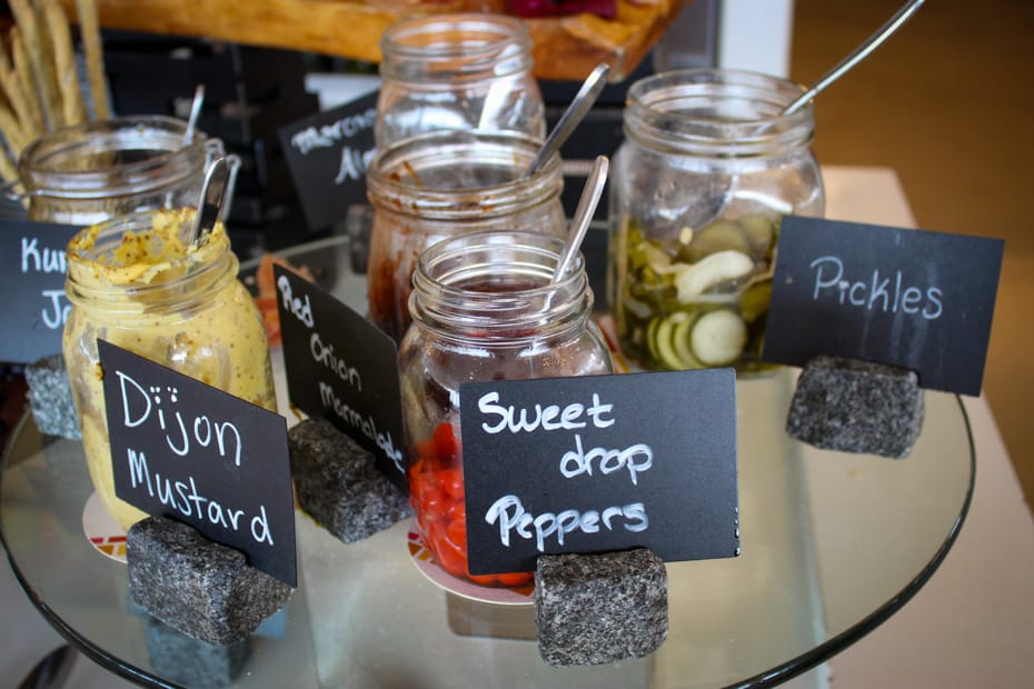 jars of items like pickles and sweet drop peppers on the brunch buffet at California Grill