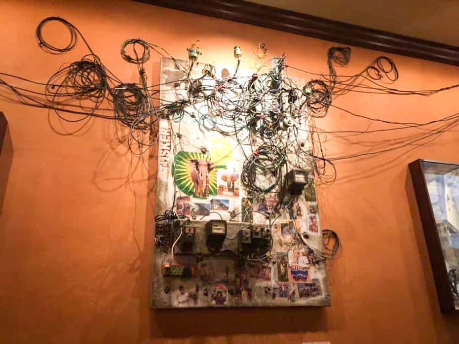 a piece of artwork with a wire sculpture in Tiffins Restaurant 