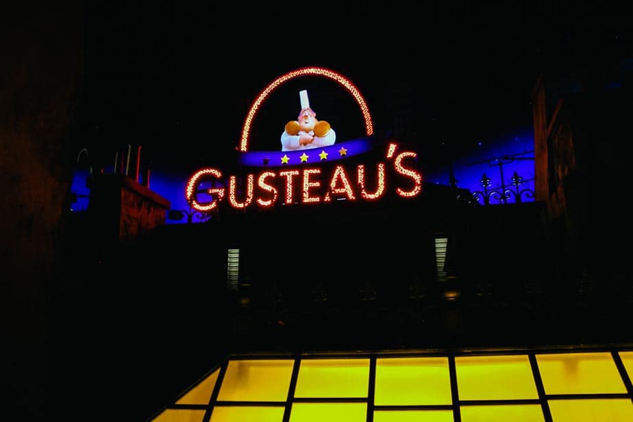 the Gusteau's sign in the interior portion of the queue at Remy's Ratatouille Adventure 