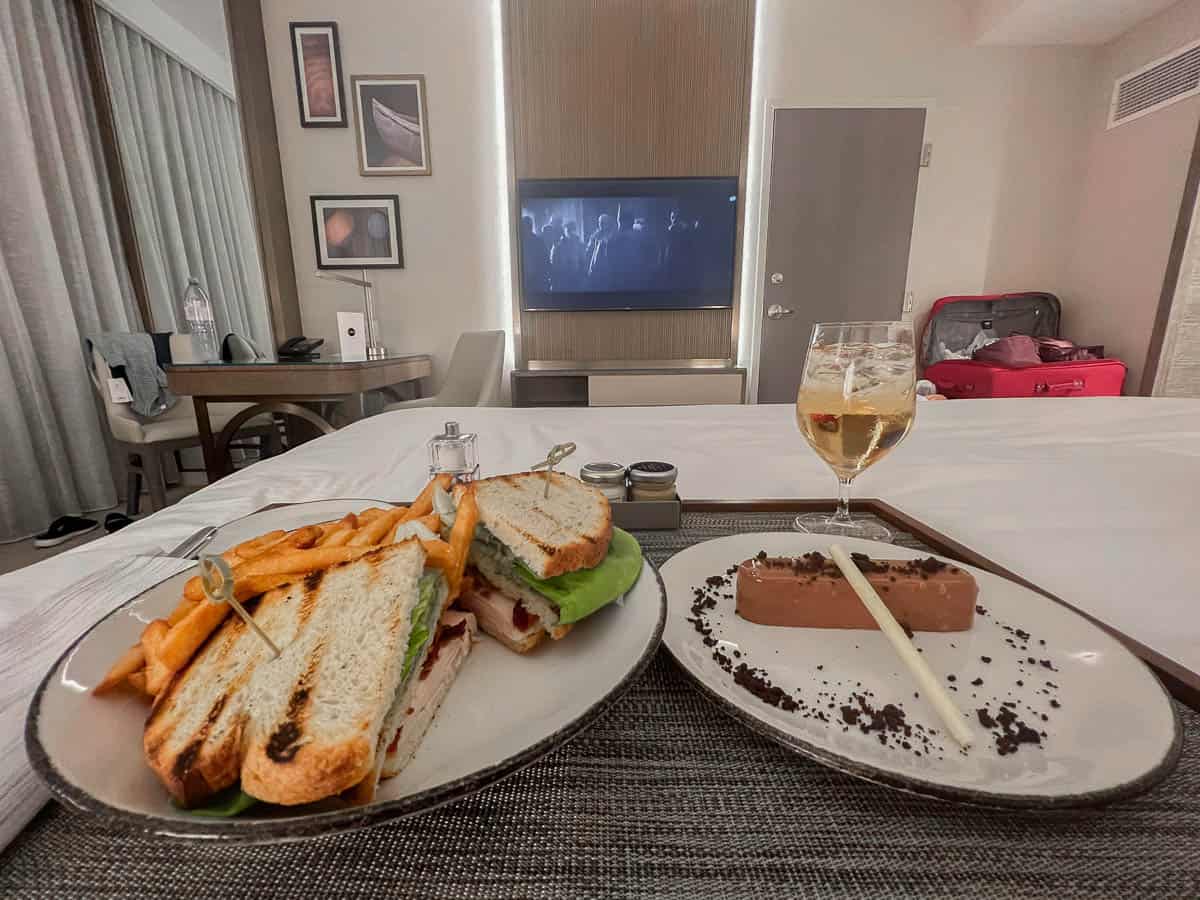 a turkey club, flourless chocolate cake, and a gingerale ordered via room service 
