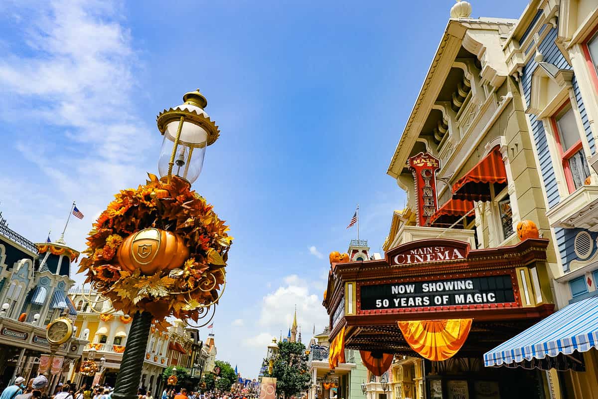 Halloween light poles adorned with Cinderella wreaths