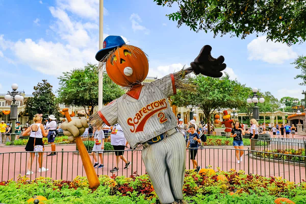 A scarecrow wearing a number 2 baseball uniform 