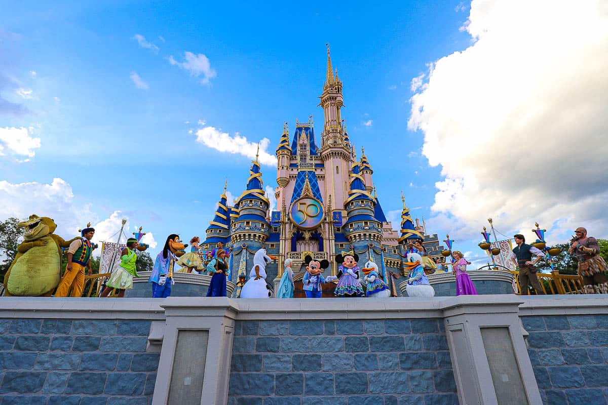 a row of characters at the grand finale of Mickey's Magical Friendship Faire 