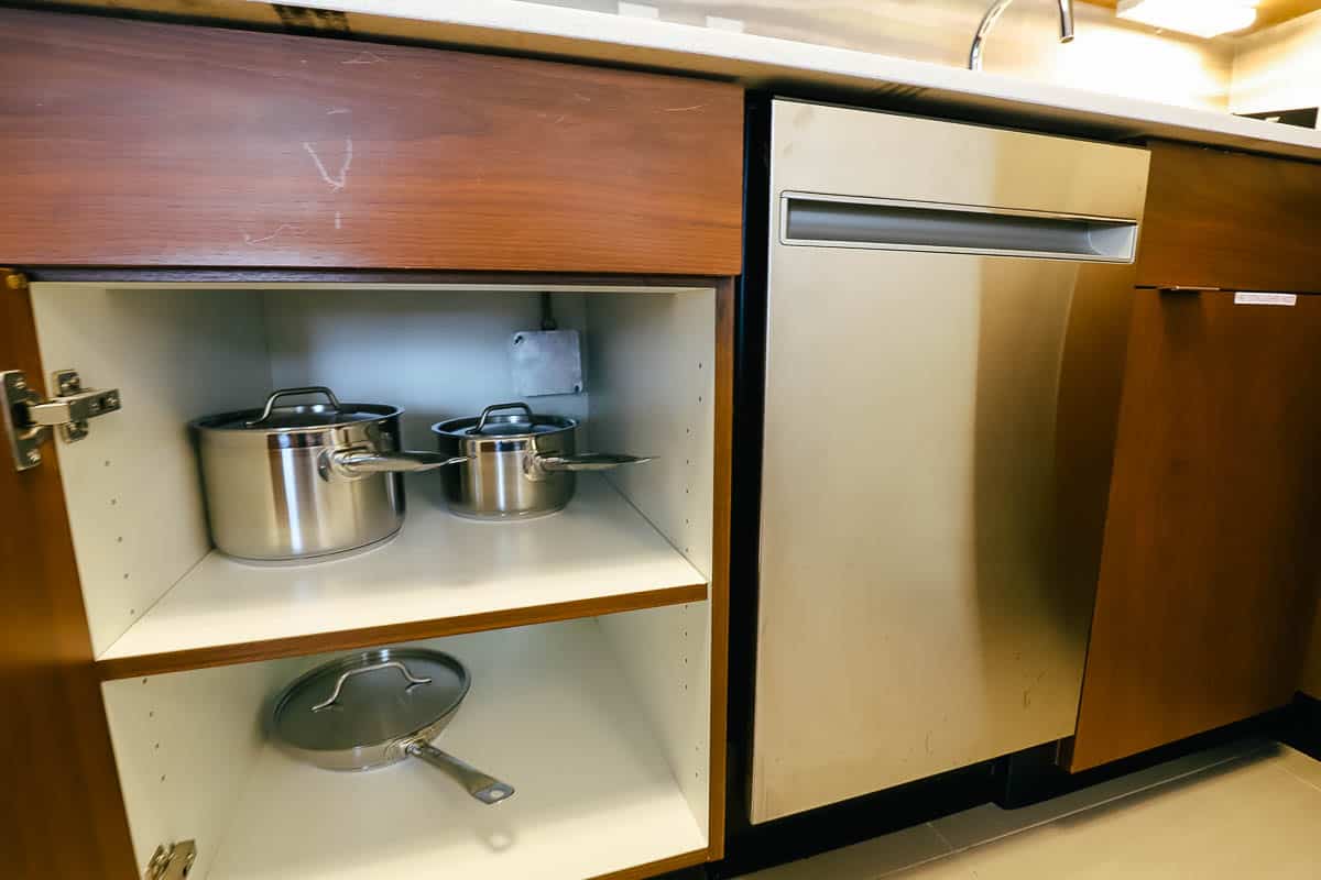 pots and pans in the cabinets 