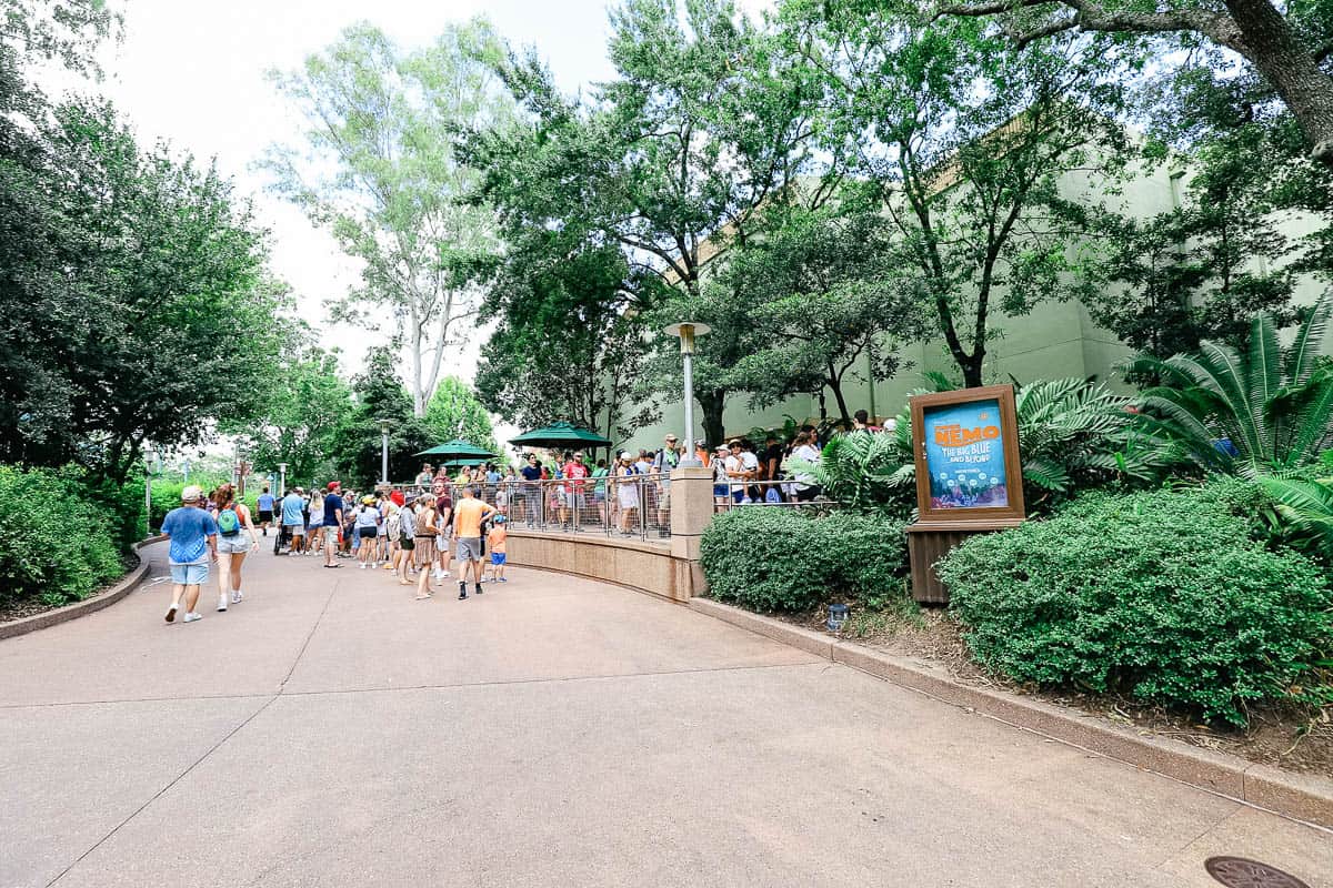 a line of guests waiting to see Finding Nemo: The Big Blue and Beyond at Animal Kingdom 