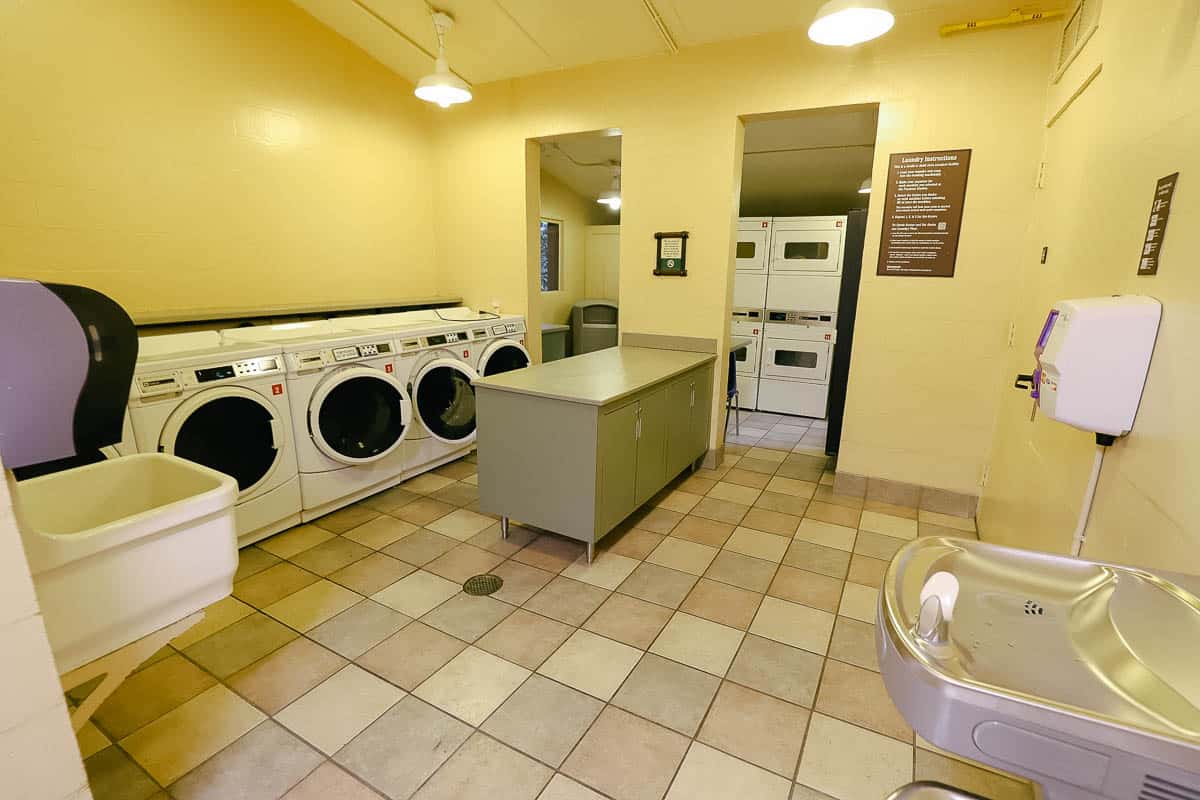 Washers, dryers, laundry sinks in a laundry room at Disney's Fort Wilderness Campground 