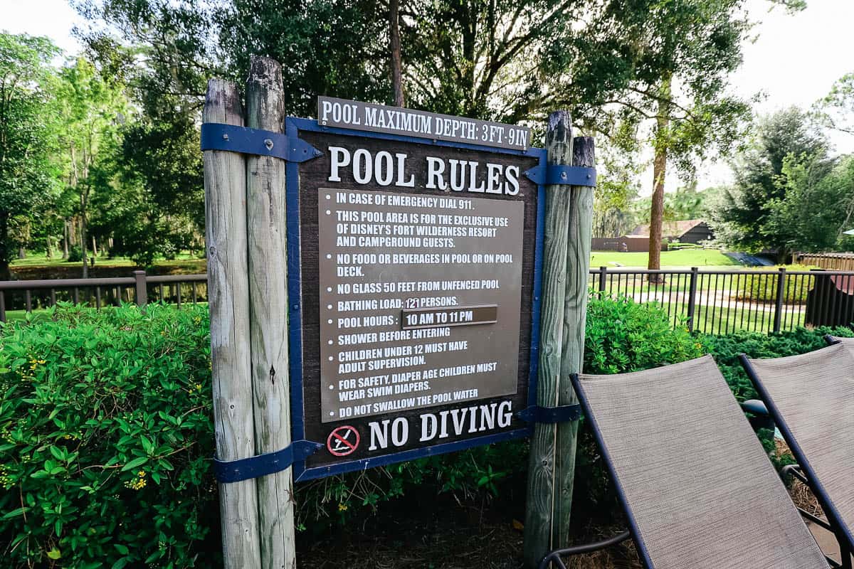 a sign with pool rules at Disney's Fort Wilderness Resort and Campground 