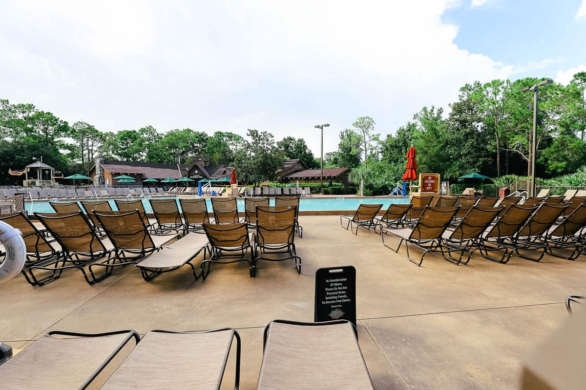 Lounge chairs around the pool at Disney's Fort Wilderness Resort and Campground 