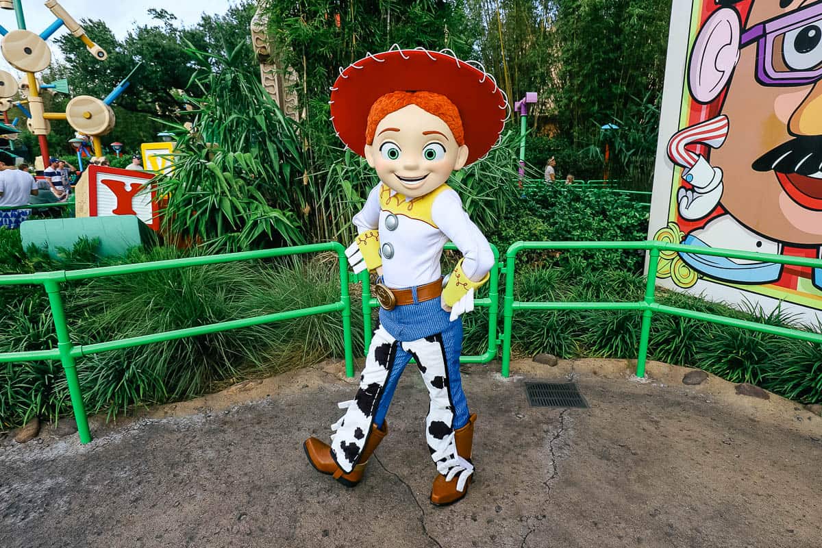 Jesse poses in her cowgirl outfit at Toy Story Land