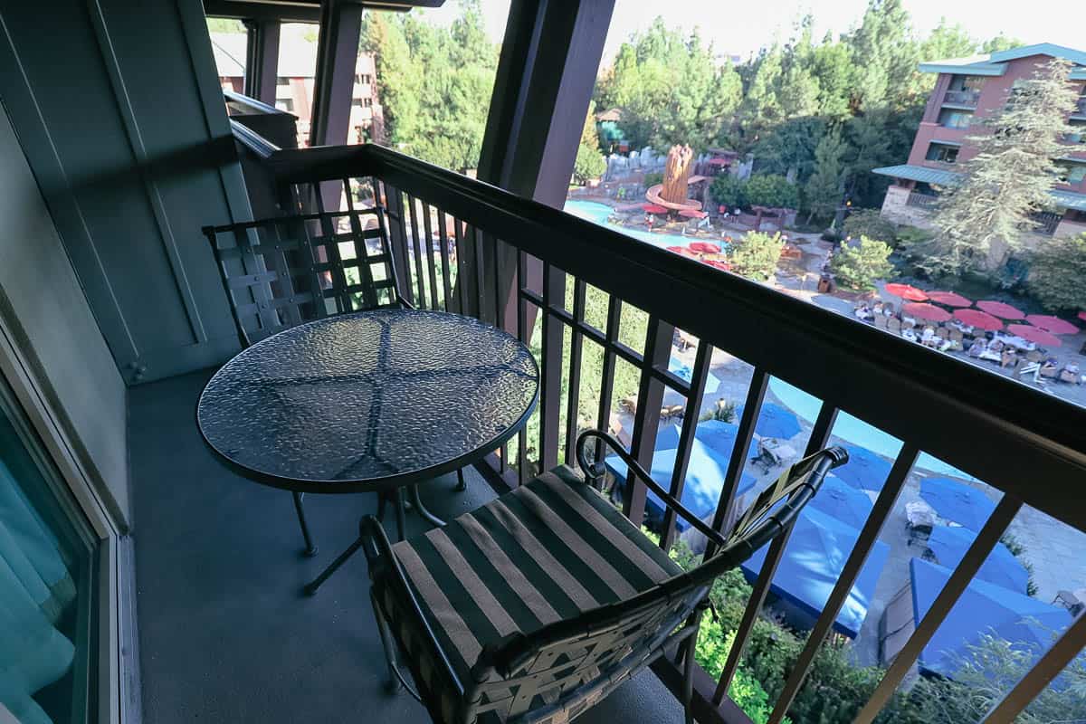 balcony with a table and two chairs at the Grand Californian 