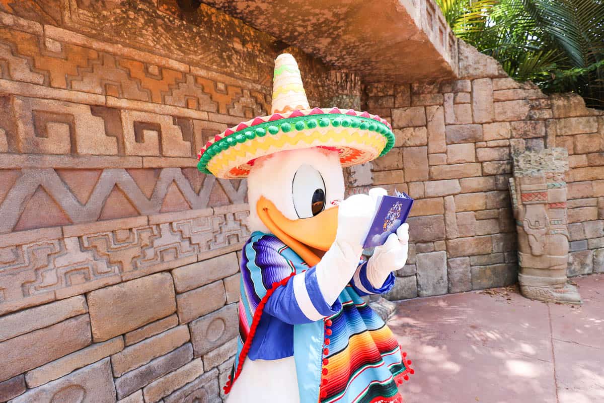 Donald Duck signs his autograph at his Mexico Pavilion meet-and-greet. 