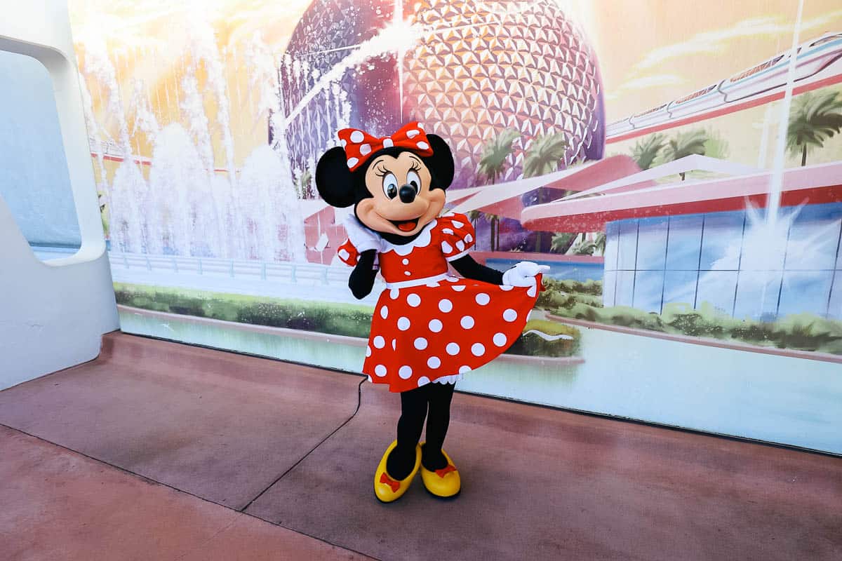Minnie Mouse wearing her red dress and yellow shoes. 
