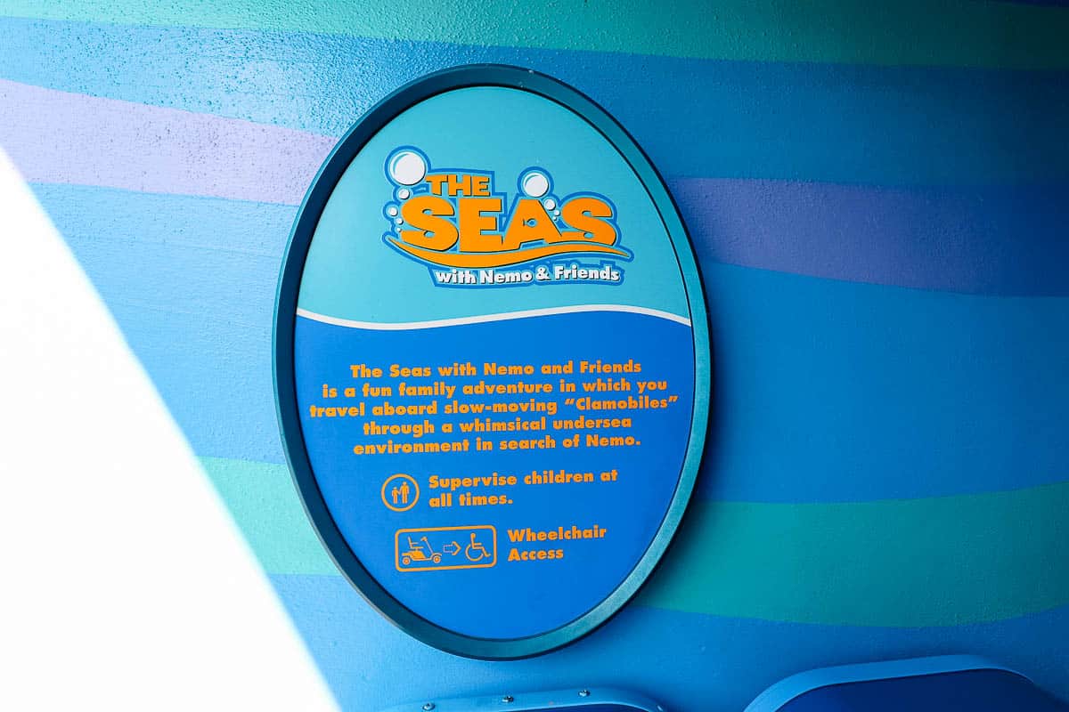 an attraction sign for the Seas with Nemo and Friends with a description of the ride 