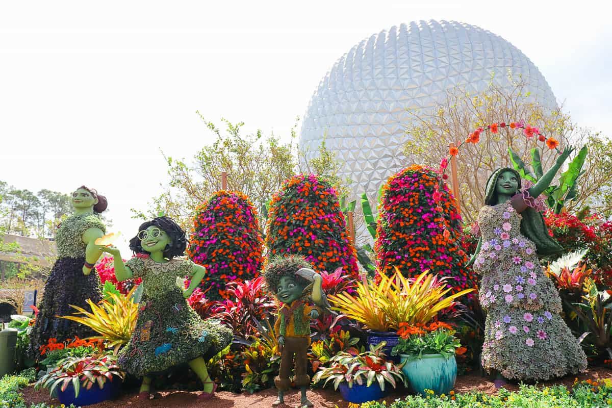 the Madrigal family characters in topiary form 