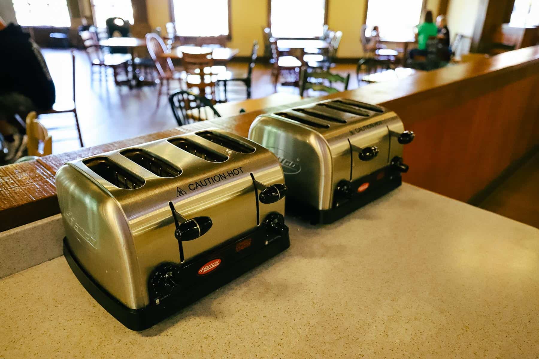 a pair of toaster ovens for guests to use 