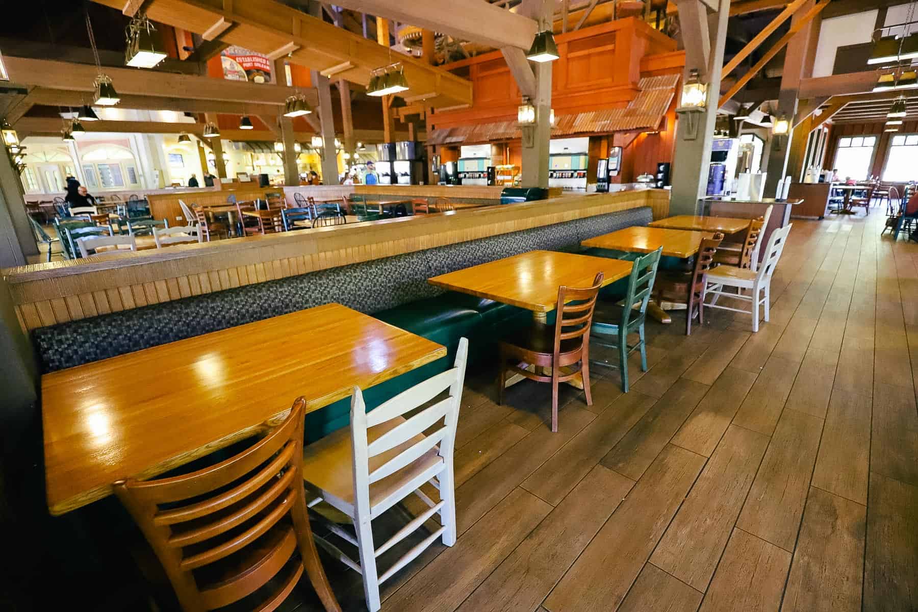 a row of tables and chairs at Port Orleans Riverside Mill 