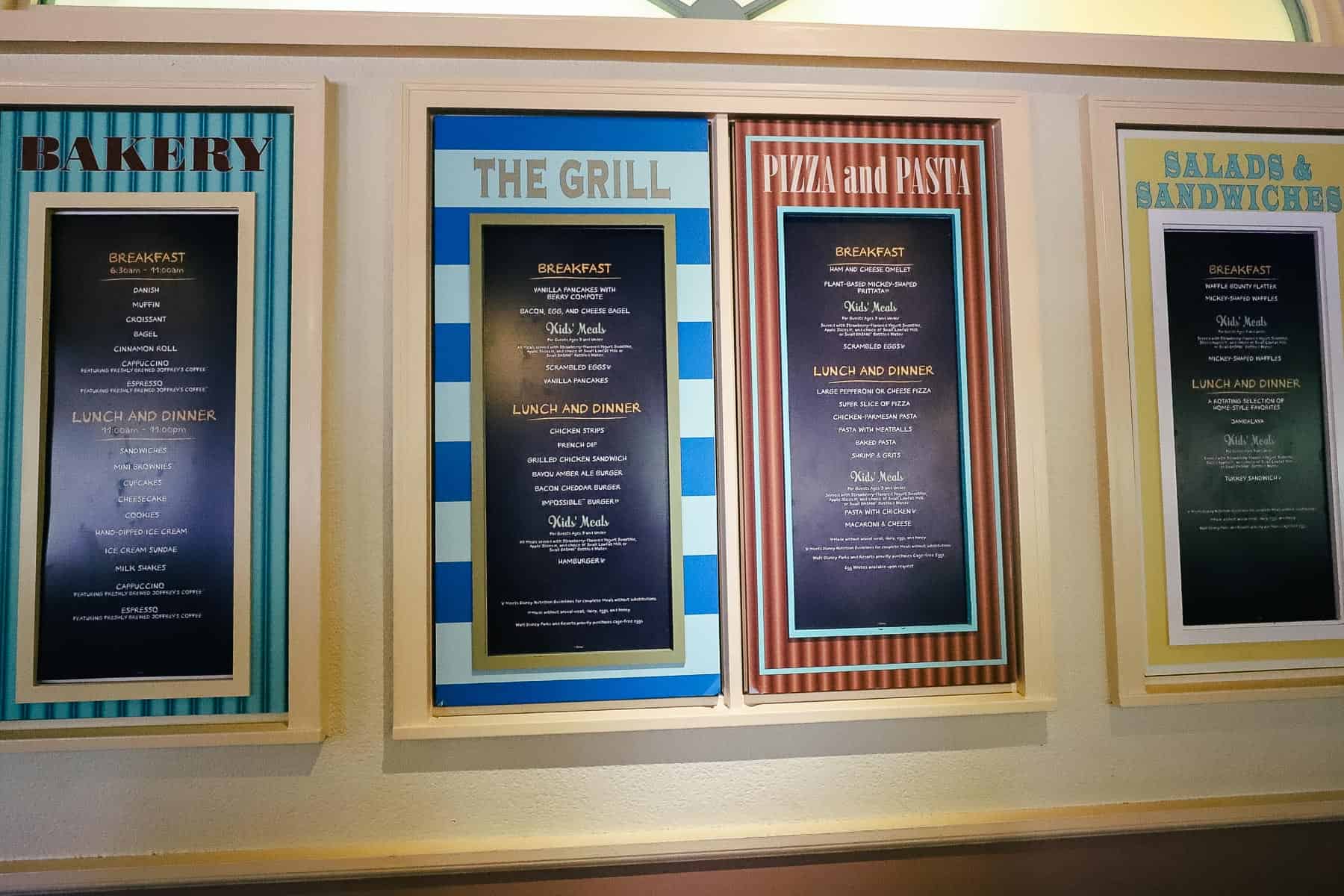 signs with menu boards for each station at Riverside Mill Food Court 