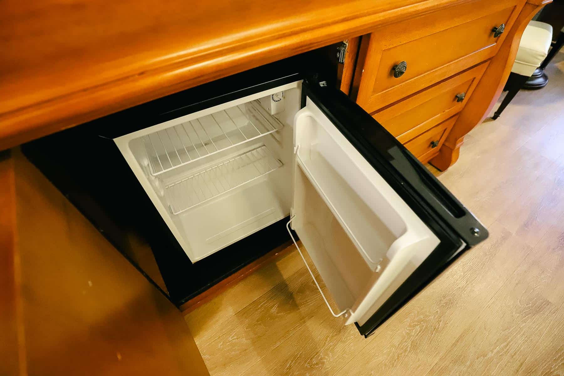 the mini fridge or beverage cooler in a Magnolia Bend Room 