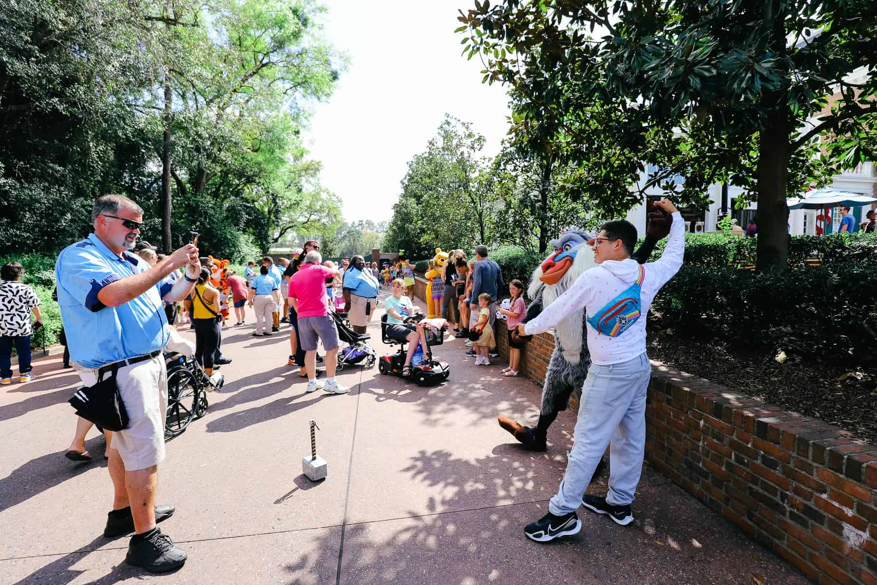 a large group of guests gathered for a surprise character training at Epcot 