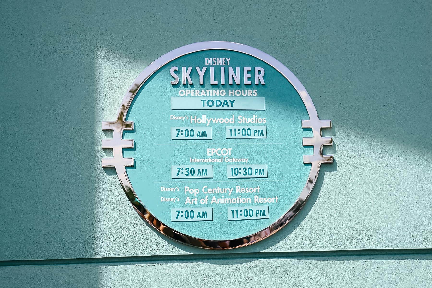 signage at Disney's Hollywood Studios for the Skyliner and its hours 