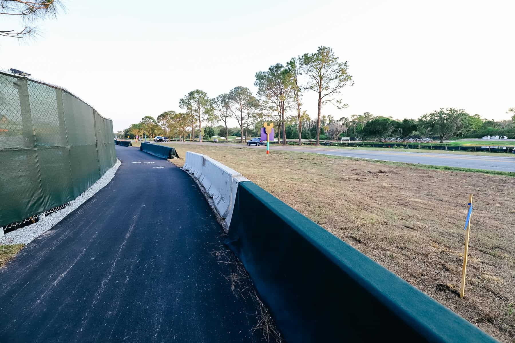 barriers that keep pedestrians away from the busy road 