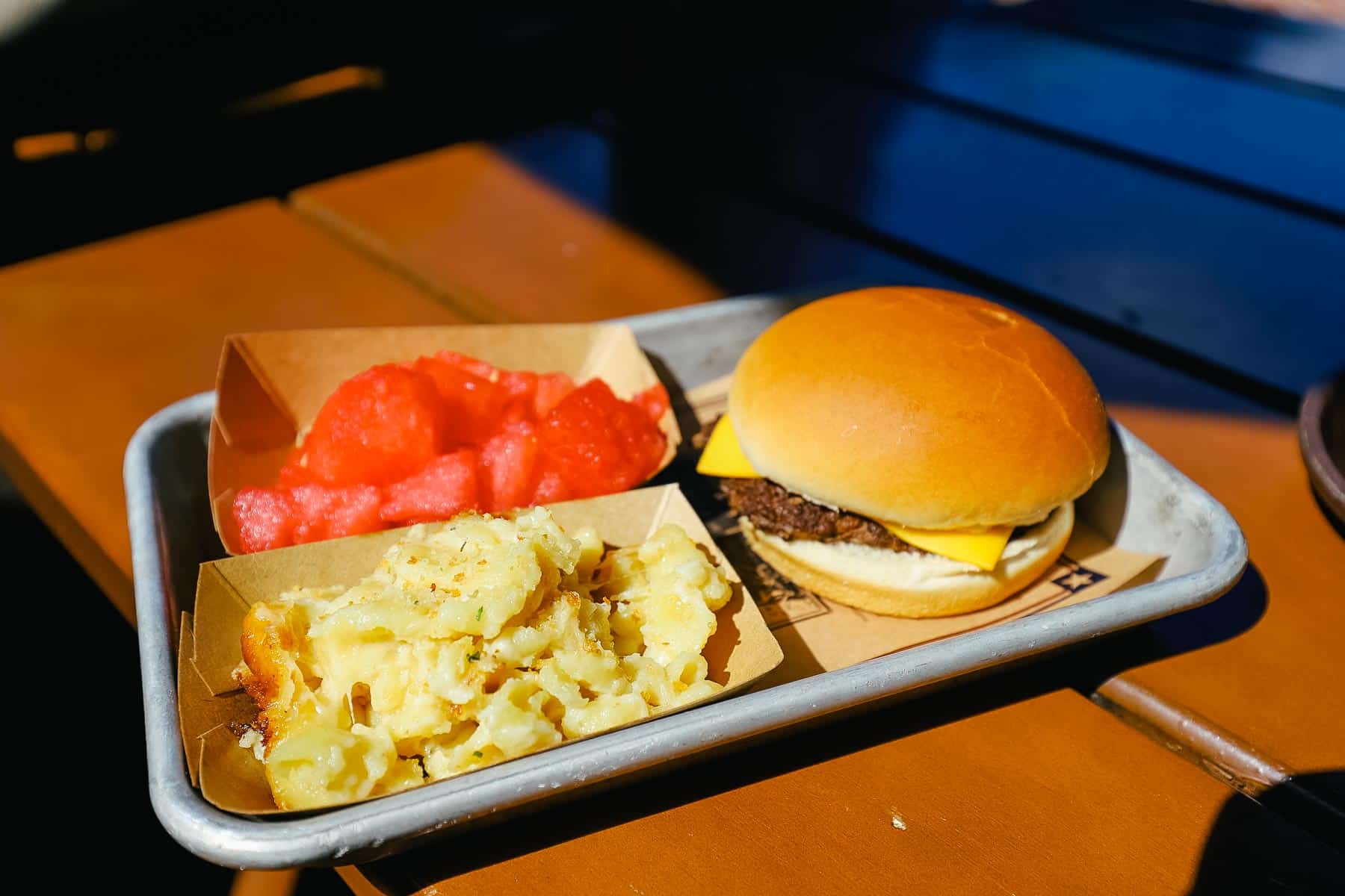 a kids' meal with a cheeseburger and sides 