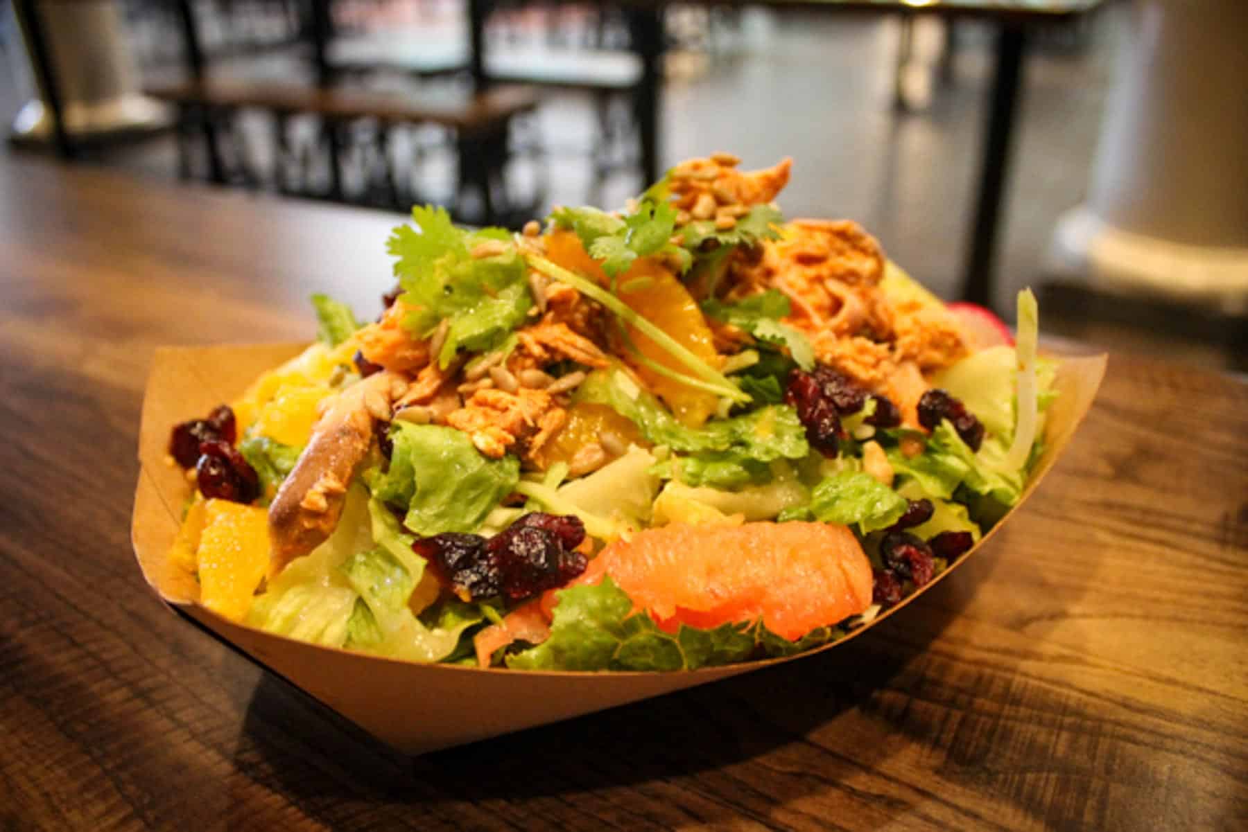 a salad in a box container 