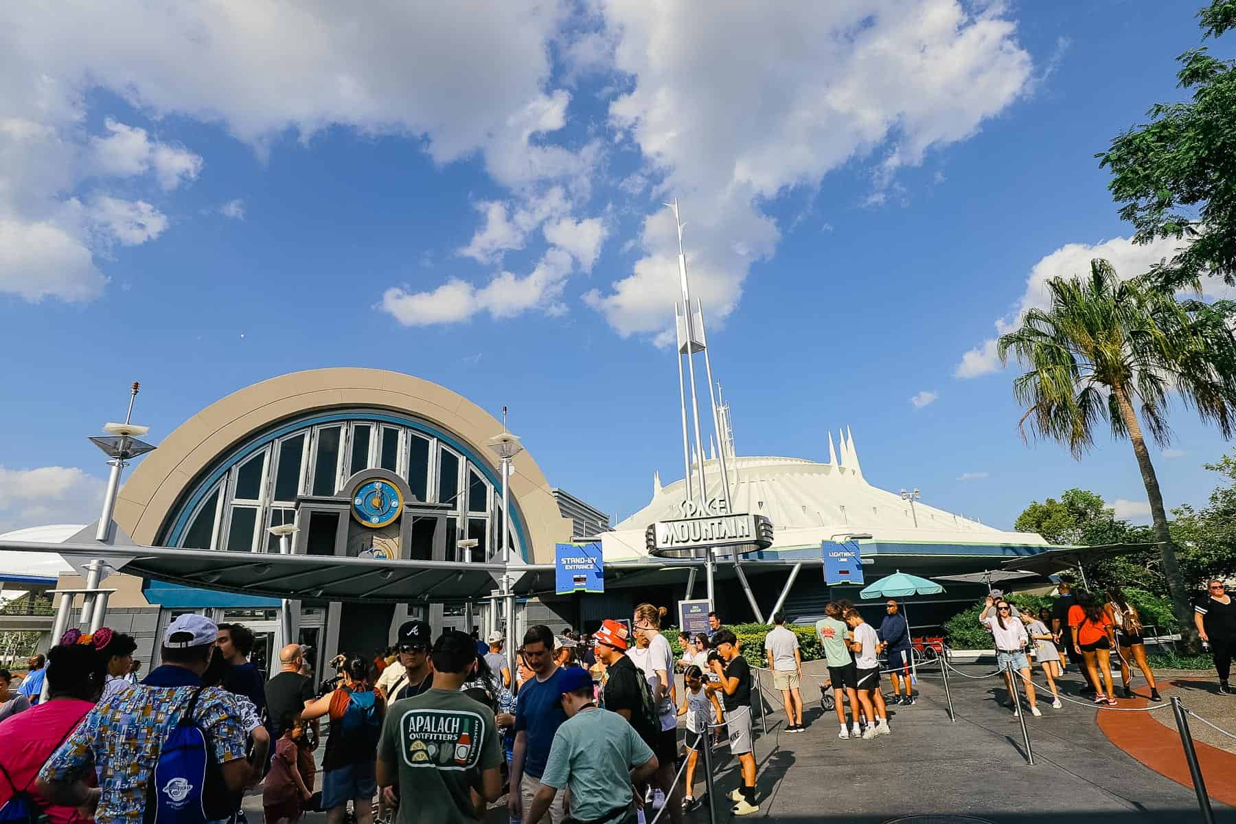 guests waiting to ride Space Mountain in Tomorrowland 