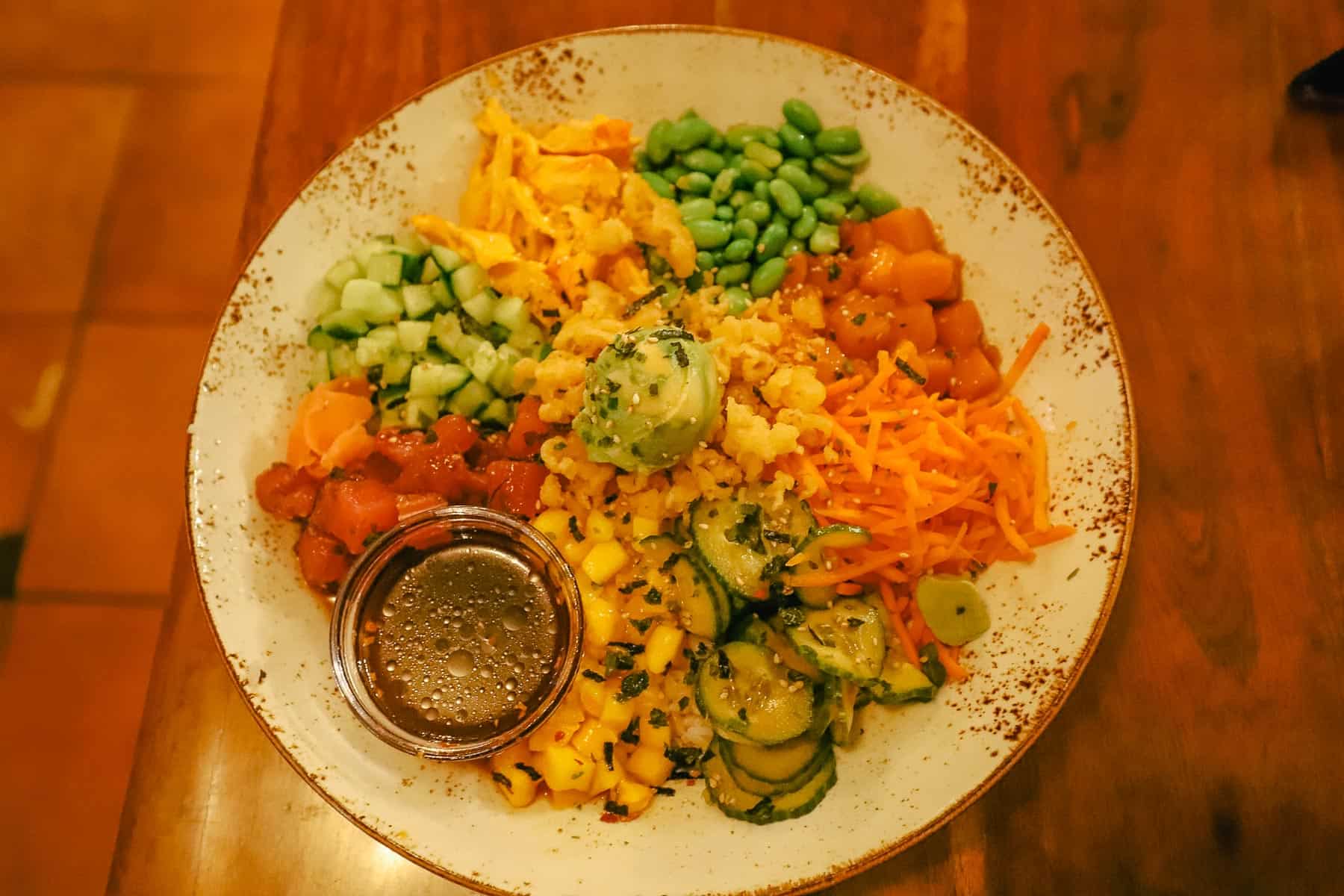 Dragon Bowl, a bowl with veggies, wasabi, spicy tuna, and crab 