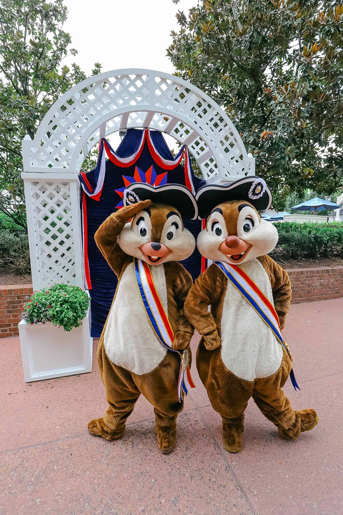 Chip and Dale salute for a photo 
