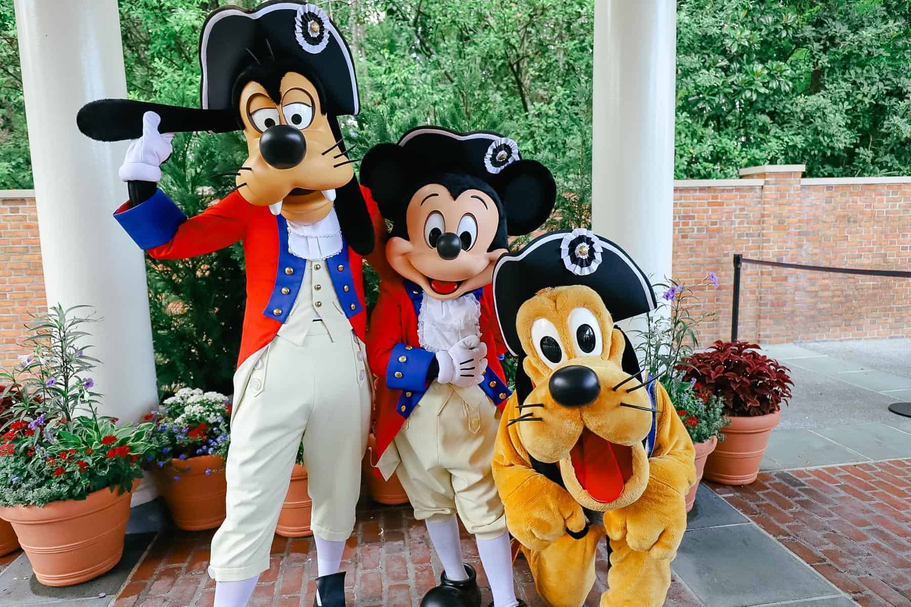 Mickey, Goofy, and Pluto in Patriotic uniforms for the 4th of July at Epcot 