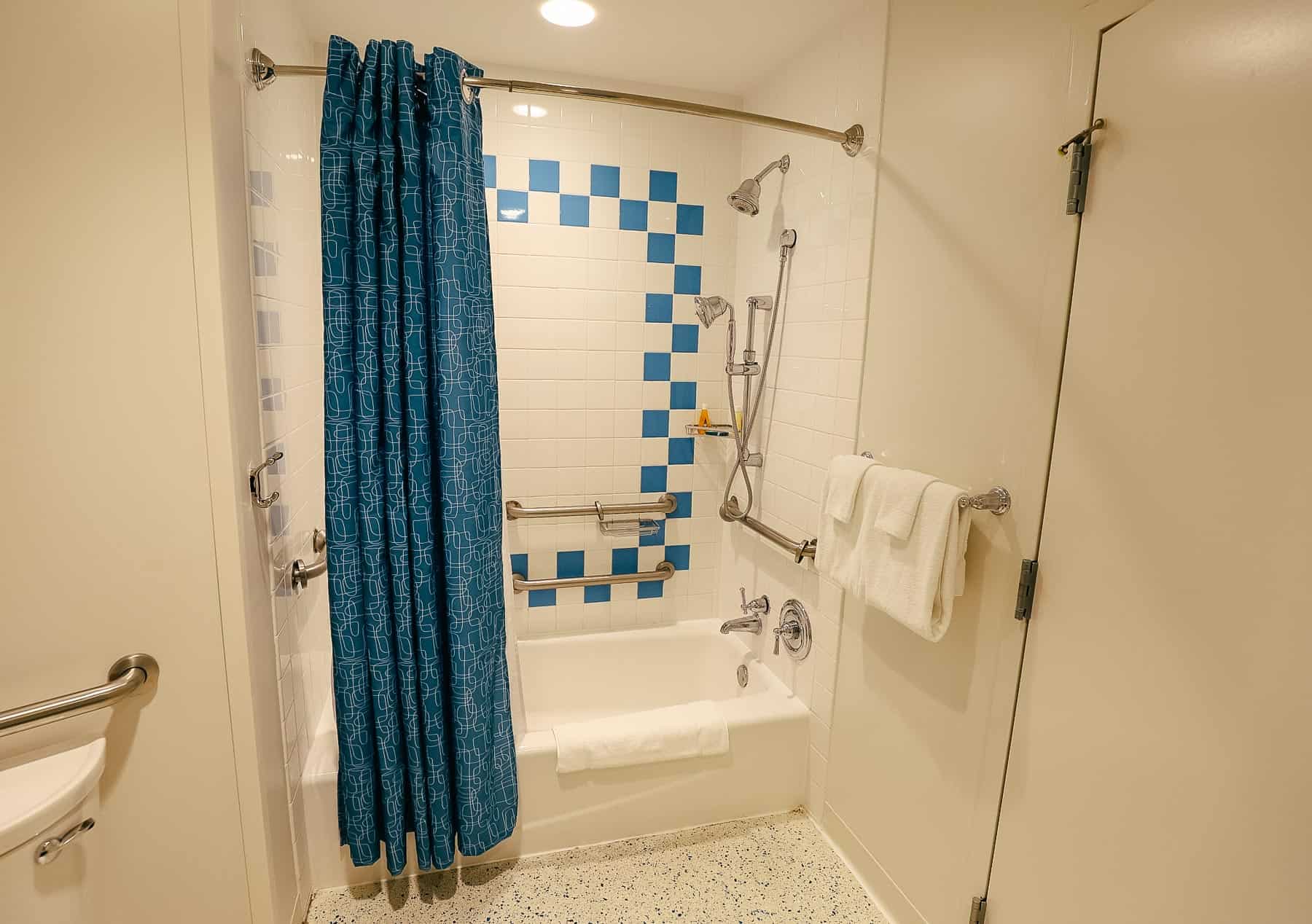 a tile tub with bath shower combination with handicap accessible options 