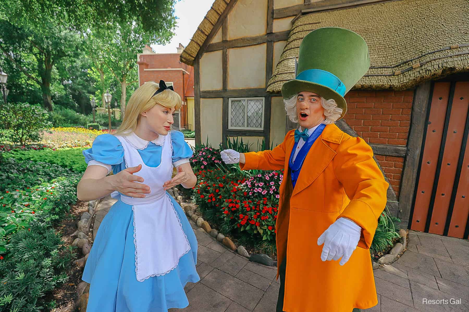 Alice and the Mad Hatter carrying on with each other. 