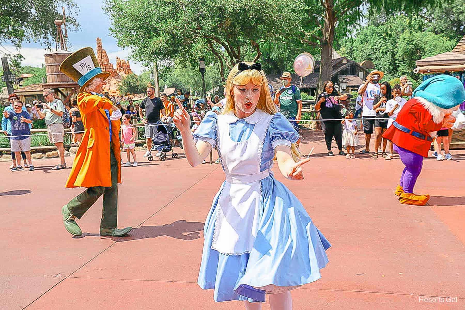 Alice in the Festival of Fantasy Parade at Magic Kingdom 