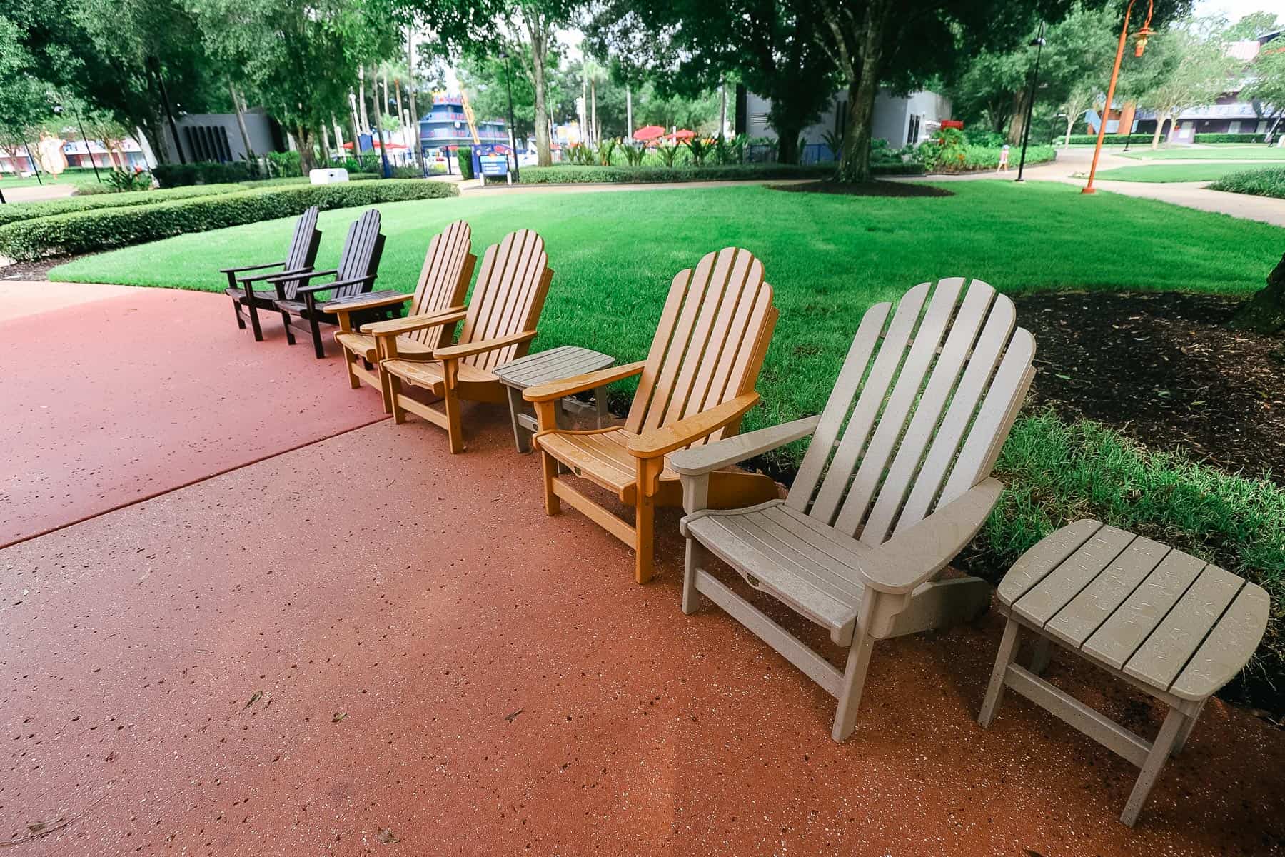 a group of Adirondack chairs at Disney's All-Star Music 