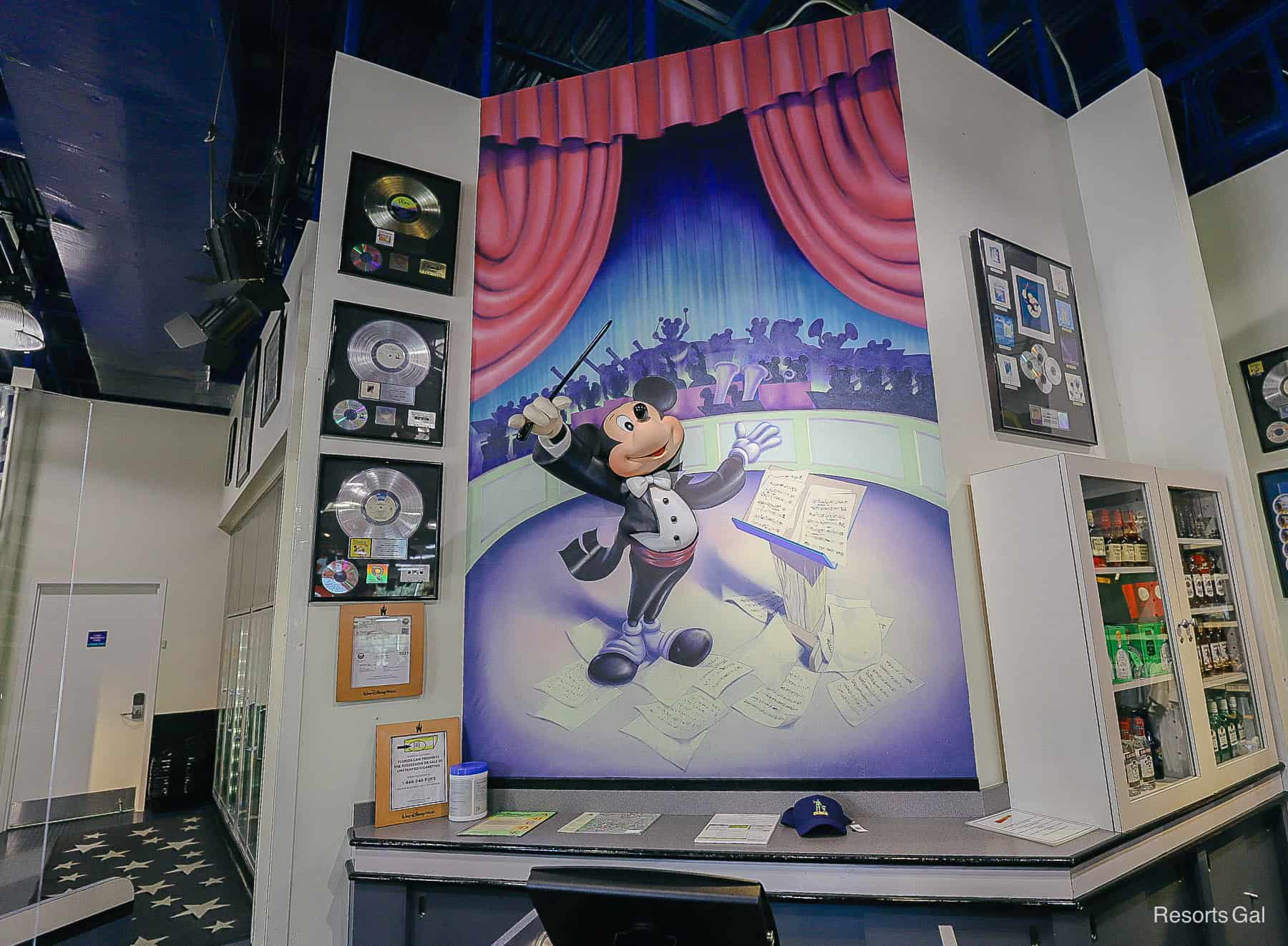 a mural of Mickey Mouse as the Maestro of an orchestra 