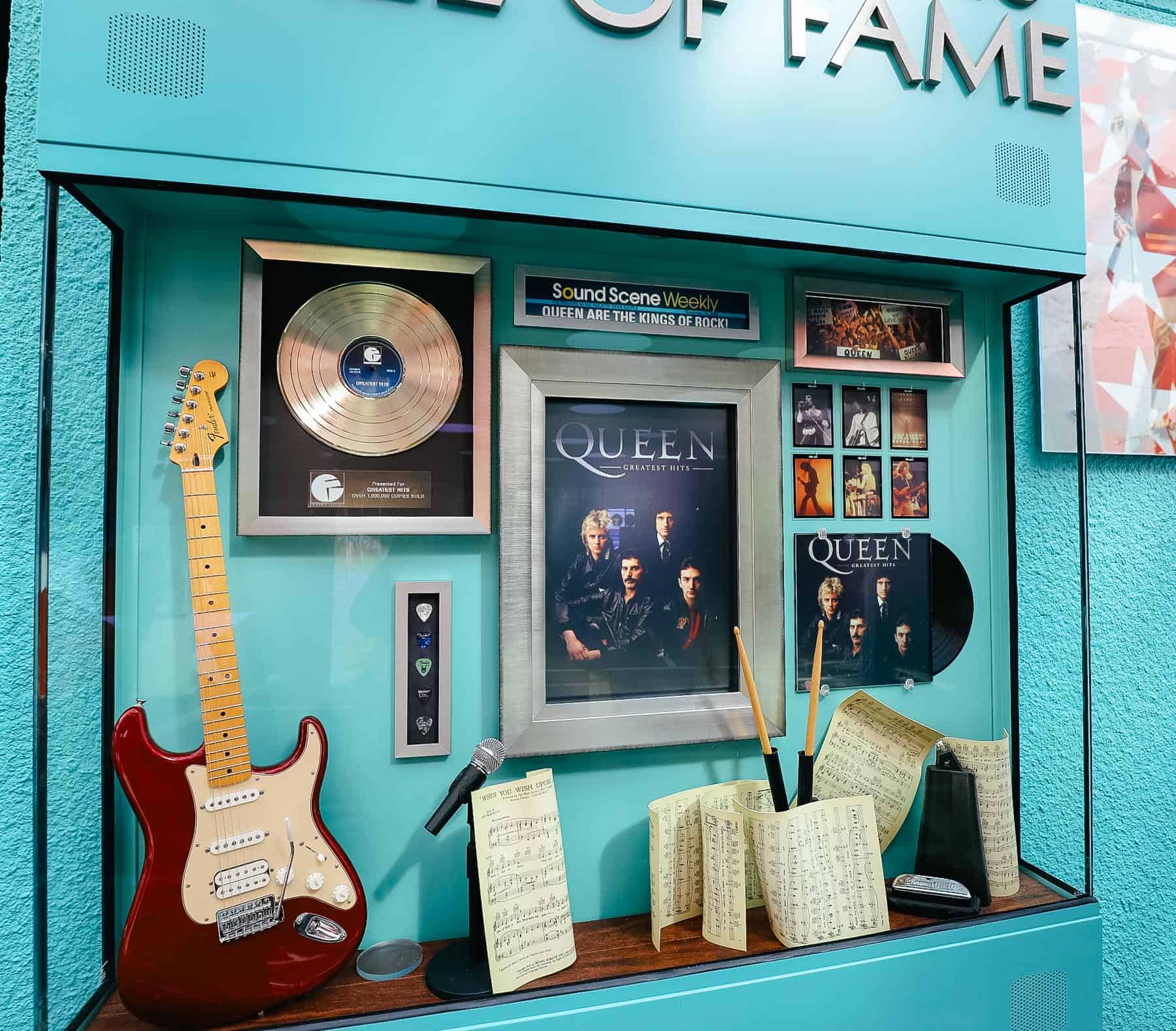 a collection of rock and roll memorabilia featuring Queen 