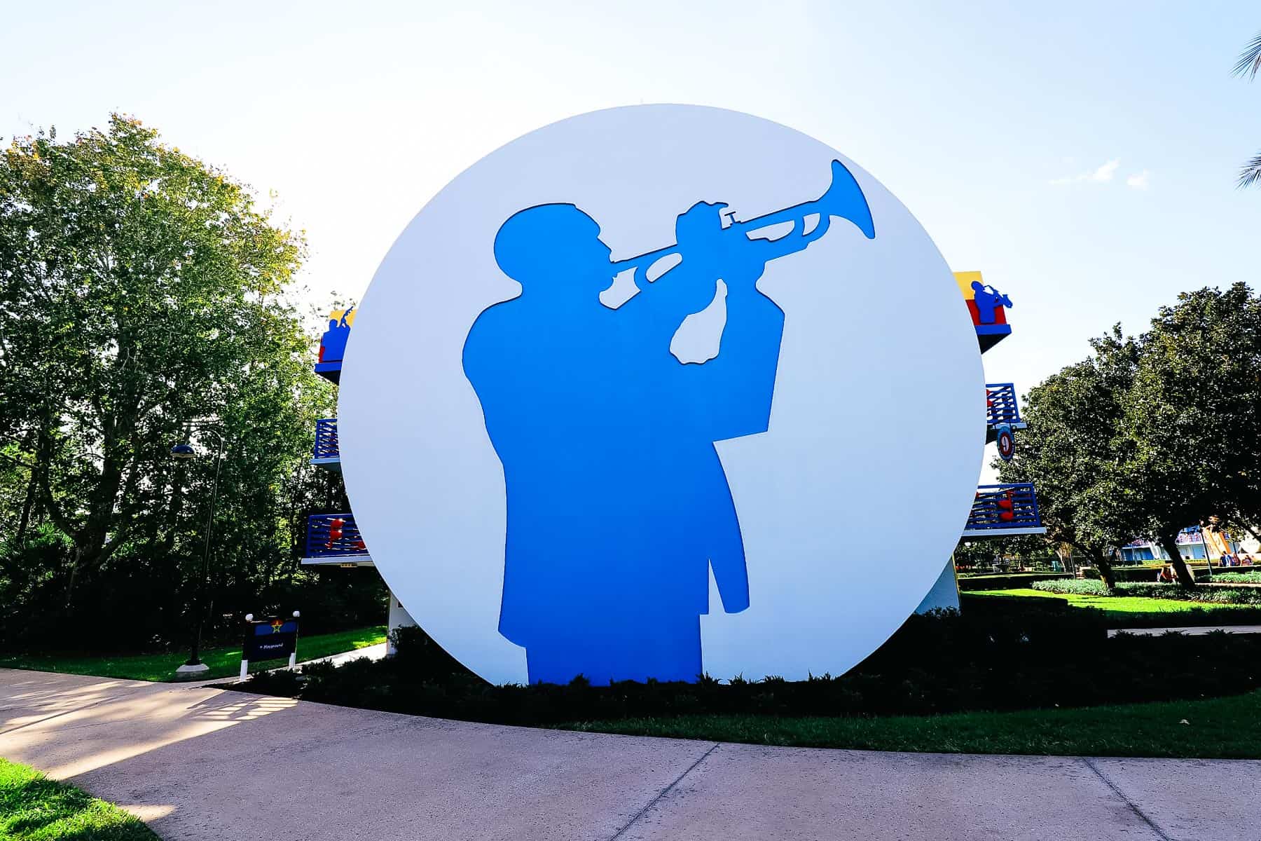 a silhouette of a musician playing a trumpet in the Jazz Inn at Disney's All-Star Music 
