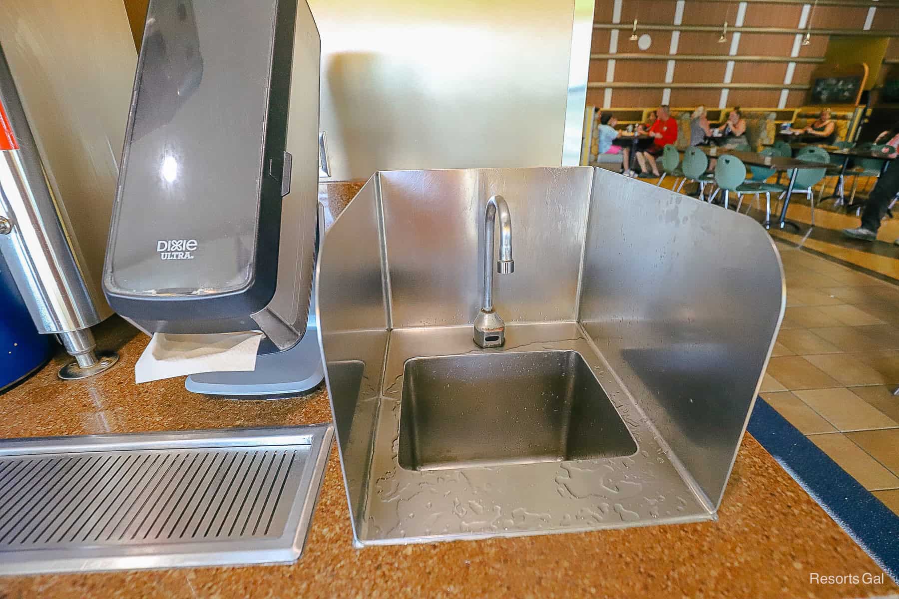a mug wash sink at the food court at All-Star Music 
