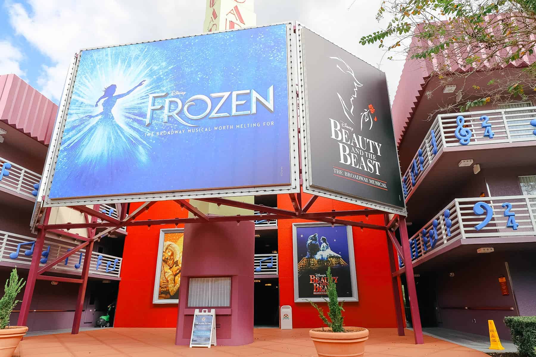 a Frozen and Beauty and the Beast Broadway billboard in the Broadway Hotel 