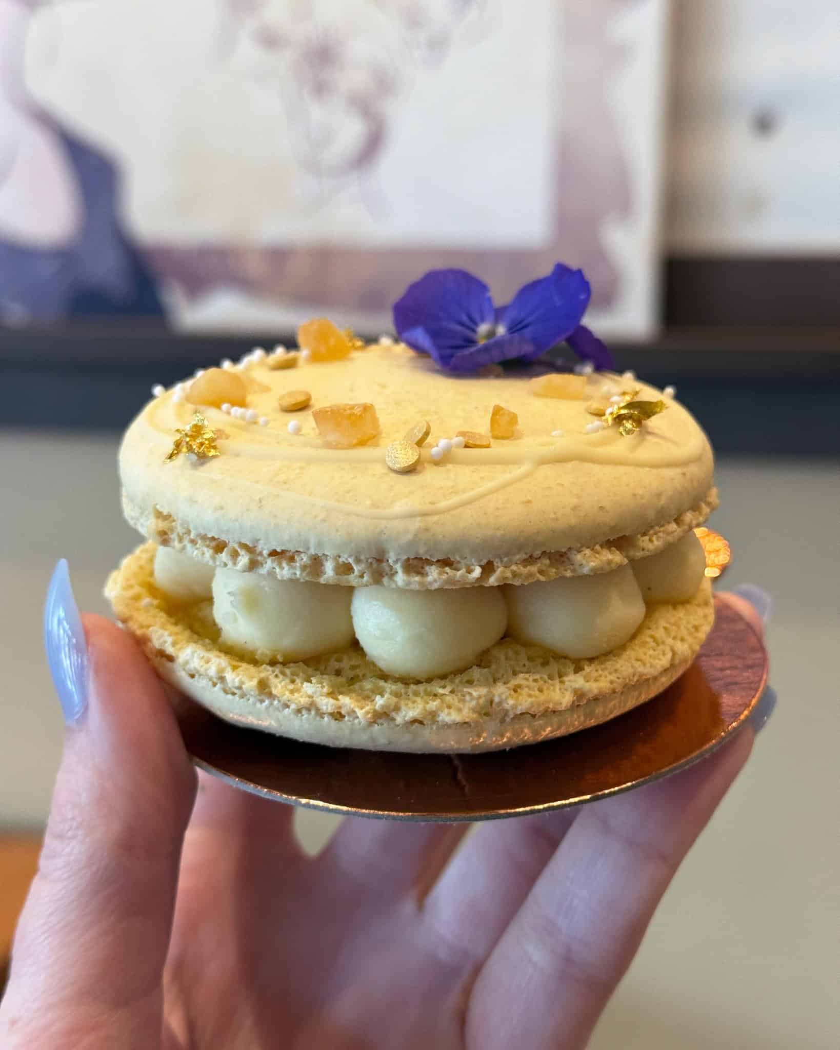 a lemon almond macaron from Amorette's Patisserie at Disney Springs