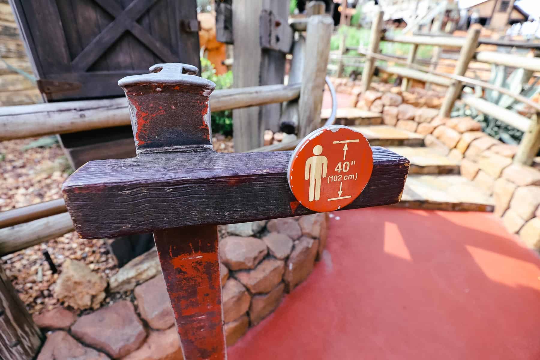 a height requirement sign at Disney World 