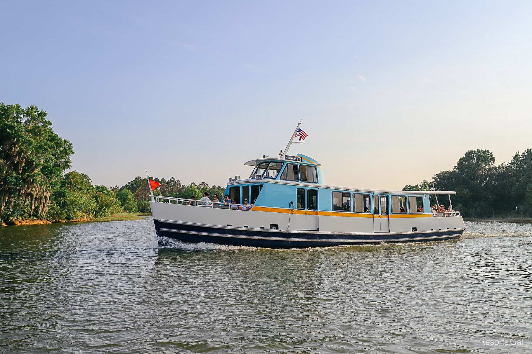 a boat that services Disney's Wilderness Lodge sailing across Bay Lake 