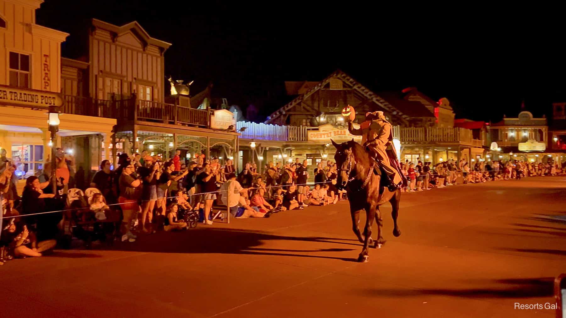 The headless horseman as he rides through Frontierland in the Boo To You Parade. 