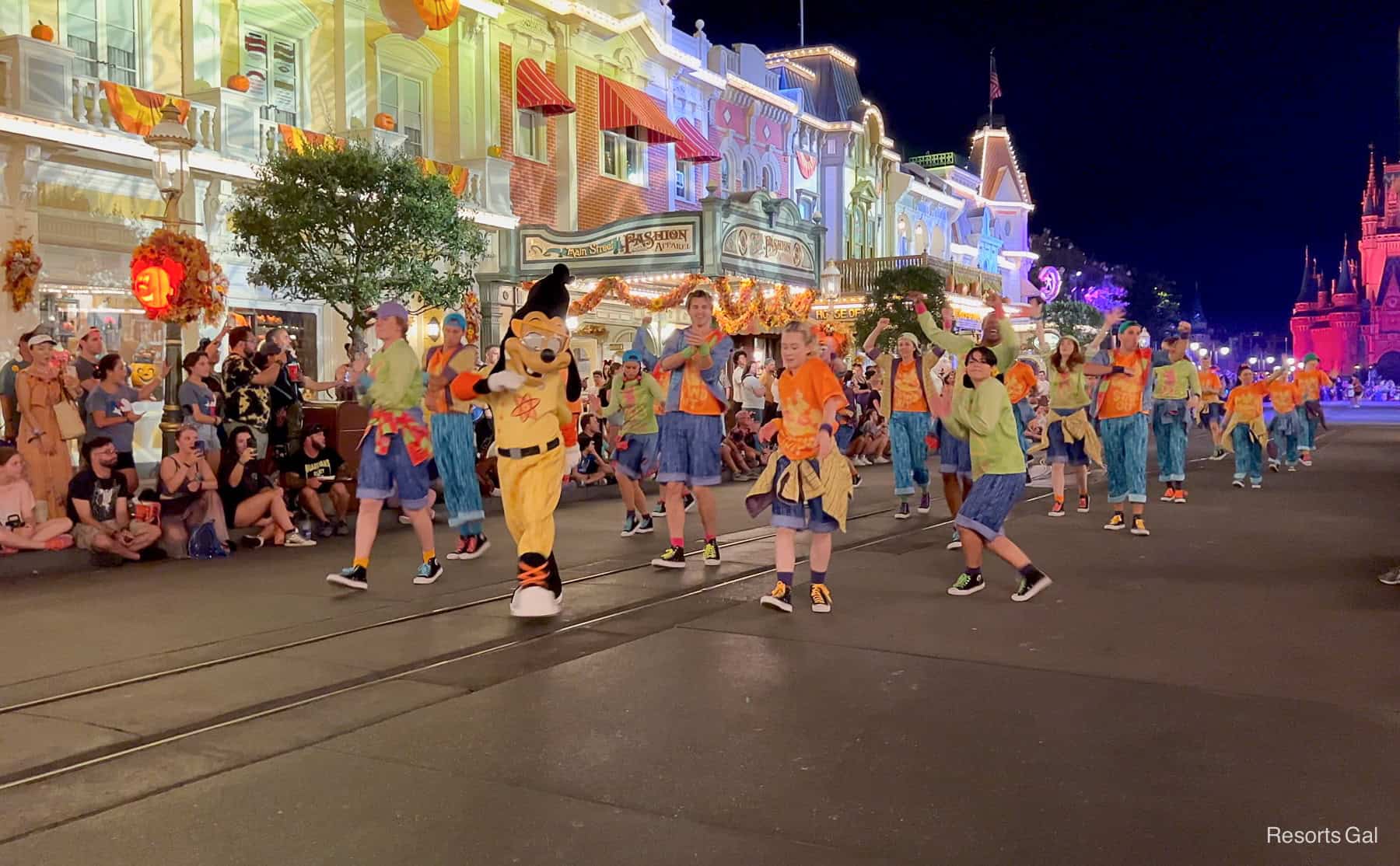 Max Goof and a troupe of dancers during the parade viewing location on Main Street USA 