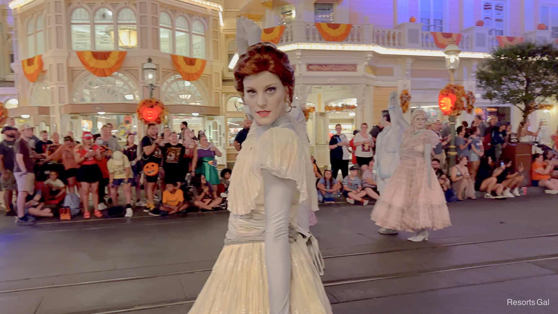 A ghost ballroom dancer poses for the camera during Mickey's Boo To You Parade. 