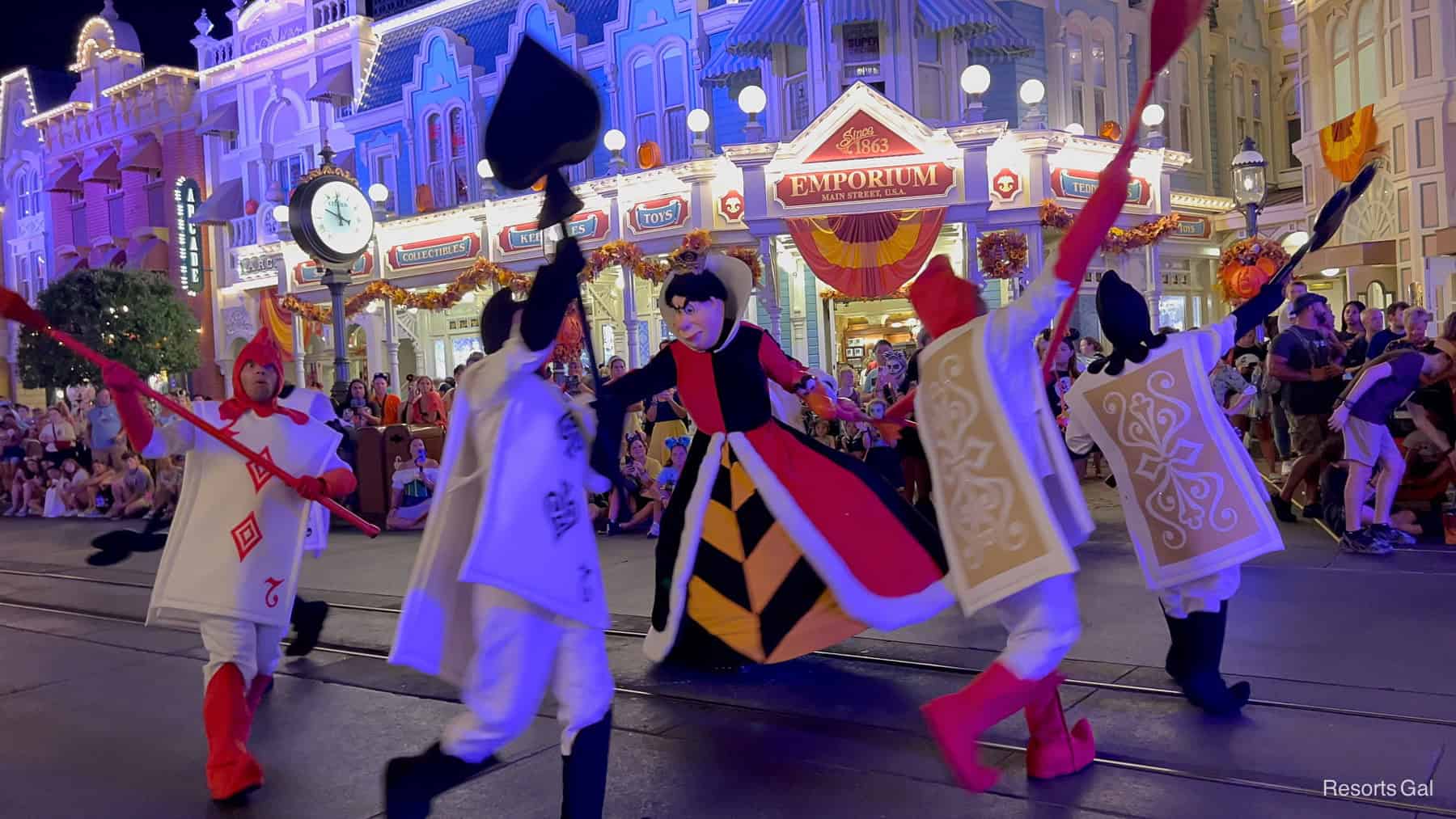 the deck of cards dance around the Queen of Hearts 